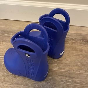 Blue CROCS rain boots for toddlers